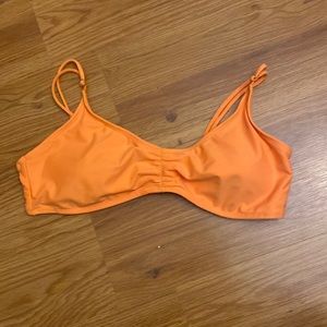 Bright orange bikini top